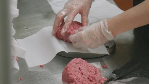 Weighing Ground Beef on Electric Scale in Restaurant Kitchen 動画素材 87149993