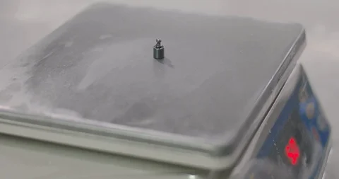 Weighing scale calibration in laboratory using a set of reference standard Video stock 129025265