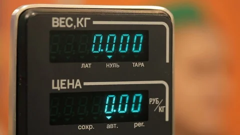 Weighing on scales Stock Footage 100270471