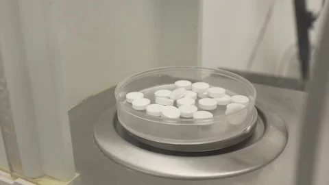 Weighing tablets,drug manufacturing Stock Footage 72643748