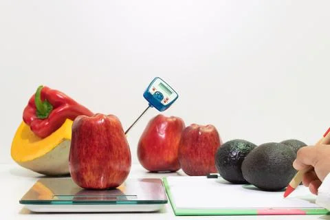 Weight and temperature control in fruit and vegetables, food safety Stock Photos