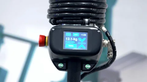 Weight display  weighing a heavy component Stock Footage 292055407