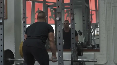 Weight lifter training at gym Stock Footage 70162375