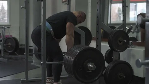 Weight lifter training at gym Stock Footage 70164252