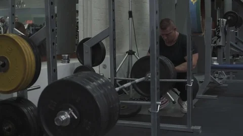 Weight lifter training at gym Stock Footage 70164374