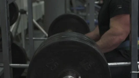 Weight lifter training at gym Stock Footage 70164758