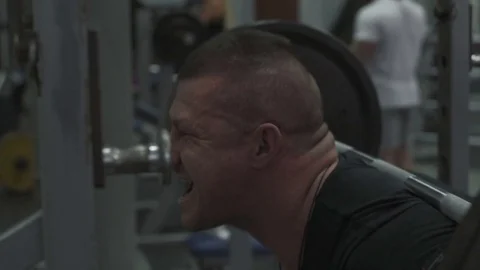 Weight lifter training at gym Stock Footage 70165930