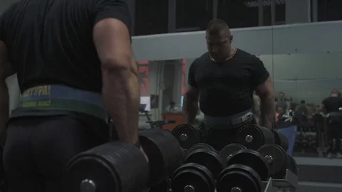 Weight lifter training at gym Stock Footage 70167670