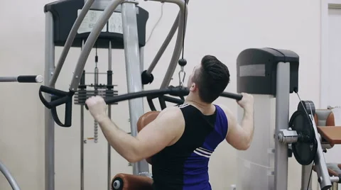 Weight loss: Man is exercising in gym Stock Footage 59160813