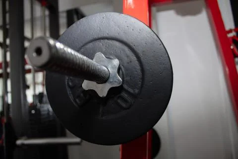 Weight machine in a gym to do arm training with weight Stock Photos