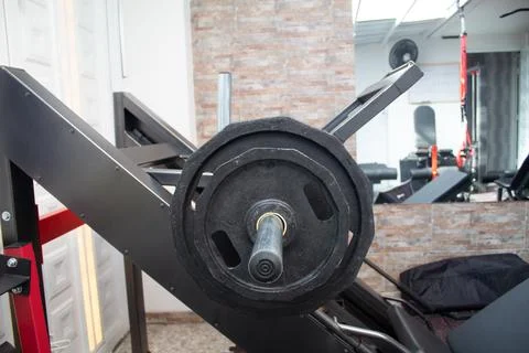 Weight machine in a gym to do arm training with weight Stock Photos