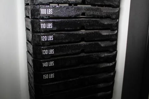 Weight machine in a gym for exercise Stock Photos