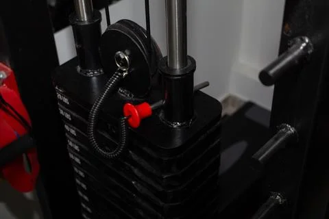 Weight machine in a gym for exercise Stock Photos