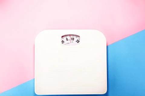 Weight measure flat lay on colored paper Stock Photos