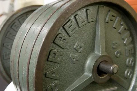 Weight plates on a rack Stock Photos