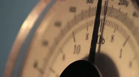 Weight scale needle moving. grams and pounds Stock Footage 11882447