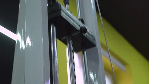 Weight stack on a cable machine in the gym Stock Footage 304774740
