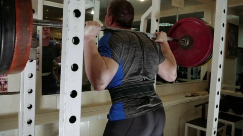 Weightlifter raises the bar Stock-Footage 75807734