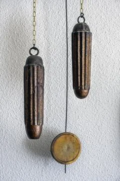 Weights and pendulum of an old pendulum clock, Germany, Europe Stock Photos