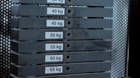 Weights on exercise machines Stock Footage 91734089