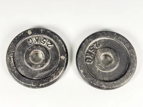 Weights lay on a table ready for a workout or gym session Stock Photos