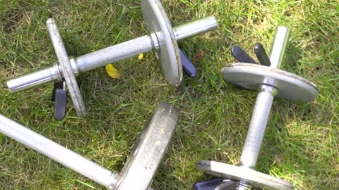 Weights Outdoors on Grass Stock Footage 138604704