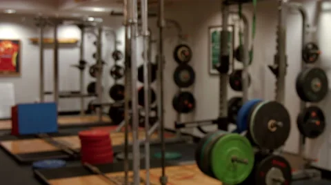 Weights room in gym Stock Footage 55610882