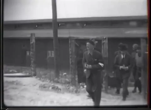 WEIMAR - 1945: Concentration Camp Visit — Past the wooden barracks Видео 342819496