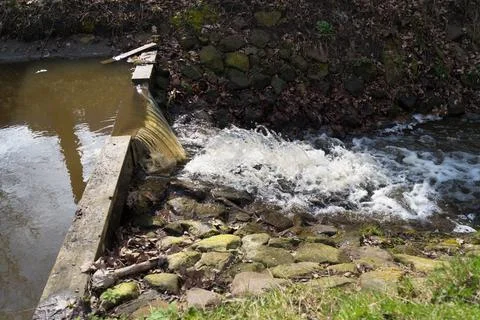 Weir in a ditch Stock Photos