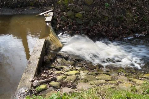 Weir in a ditch Stock Photos