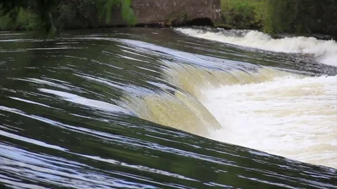 Weir in full flow closer view Stock Footage 76810245