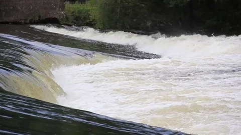 Weir in full flow Stock Footage 76810308