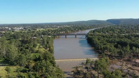 Weir on Nepean river with flooded trees to bridges near Penrith, 4k. Stock Footage 152080104