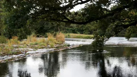 A Weir On The River Dee Creates Horseshoe Falls In Denbighshire Wales Stock Footage 96131325