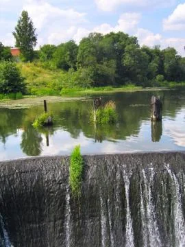Weir in the river Stock Photos