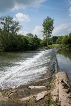 Weir on river Stock Photos