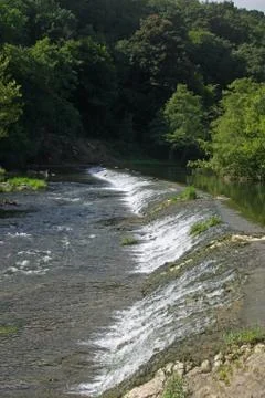 Weir on river Stock Photos