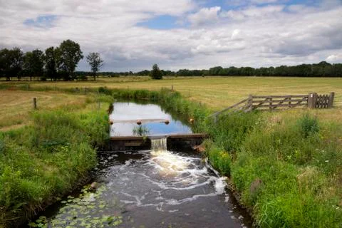 Weir in the river Stock Photos