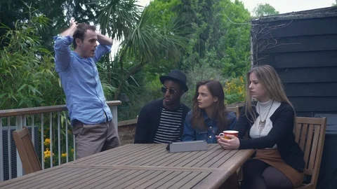 Weird friend dancing after win proudly in front of friends Stock Footage 89921241