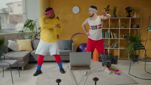 Weird funny multi-ethnic couple of retro athletes engaged in sports dancing into Stock Footage 133073968