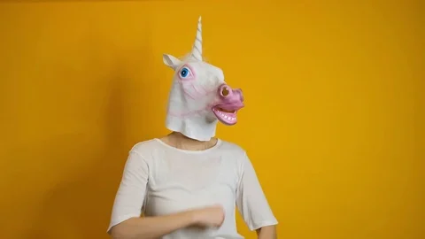 Weird funny video - woman with unicorn h... | Stock Video | Pond5