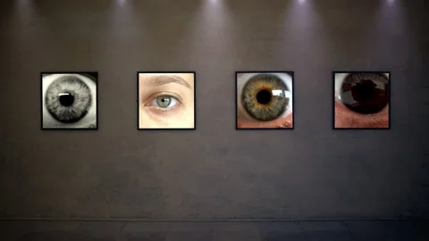 Weird Glitching Eyes Close Up Portraits Displayed on Gallery Wall Screens Stock Footage 341671702