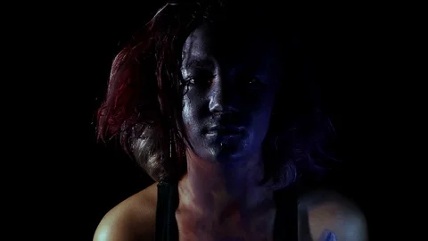 In weird makeup and looking confused Stock Footage 123097888