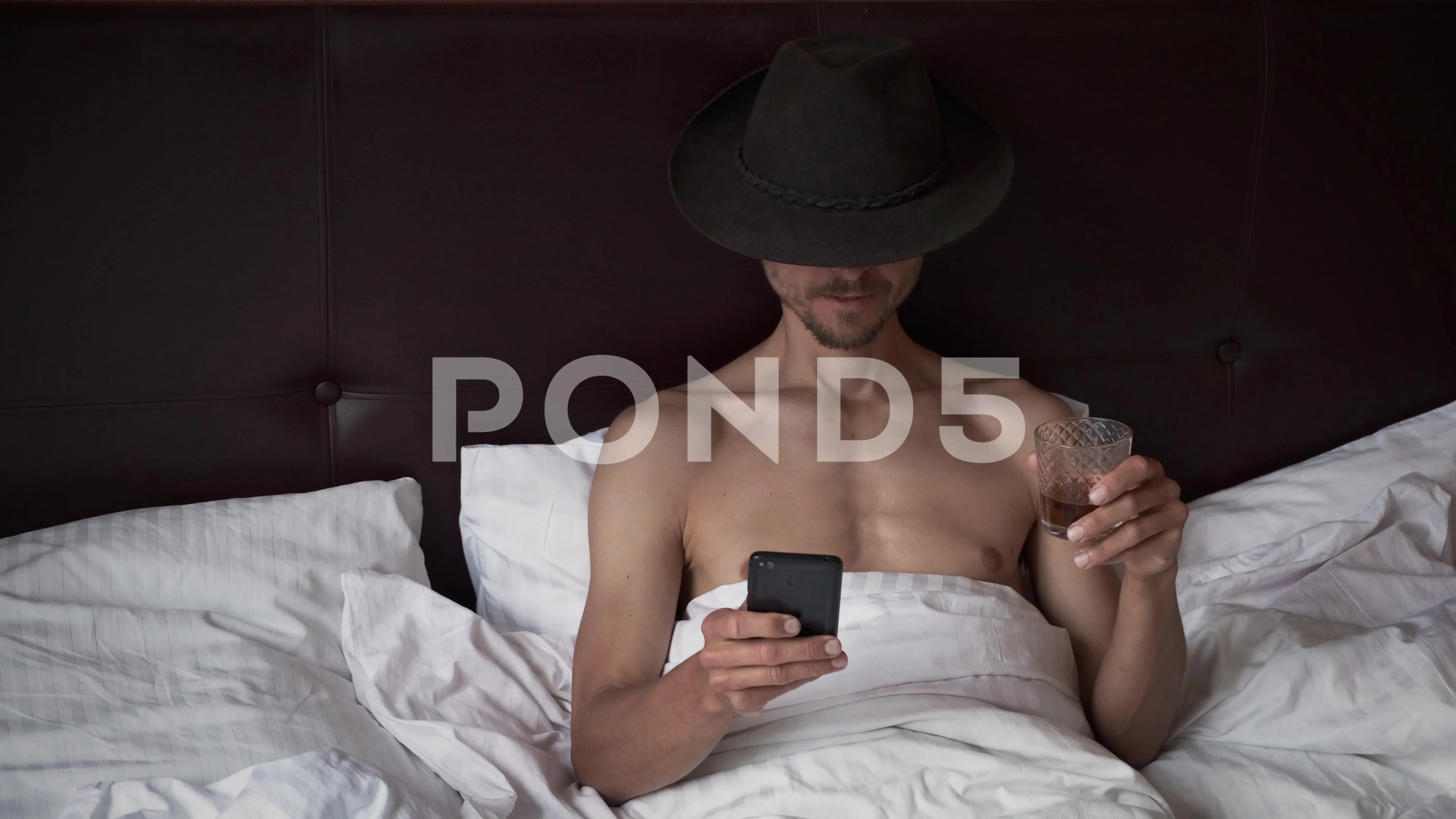 cowboy hat on the bed