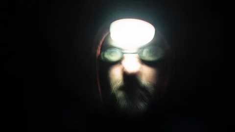 Weird man in the dark Stock Footage 103279690