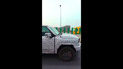 Weird pattern on the test car to disguise it on the road. Vertical. Stock Footage 307598067