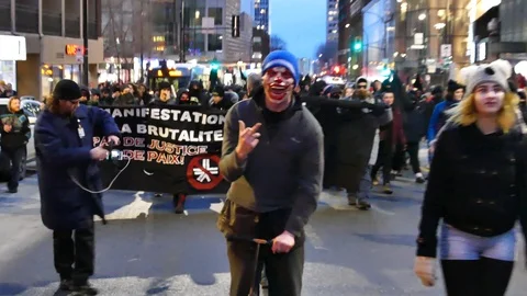 Weird protesters making the finger Stock Footage 105345833