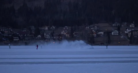 Weissensee lac cutting ice bis getting the ice out of the water04170932 Stock Footage 264973786