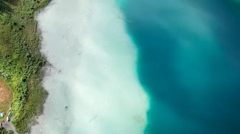 Weissensee - A top down drone shot of a turquoise Alpine lake Stock Photos