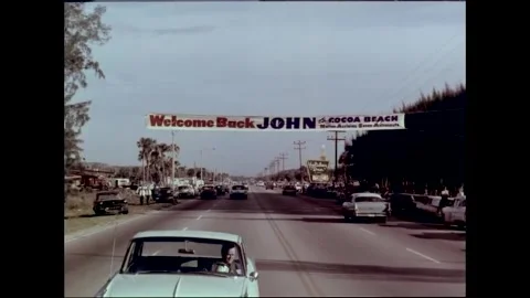 Welcome Back banner erected for astronaut John Glenn Stock Footage 262065076